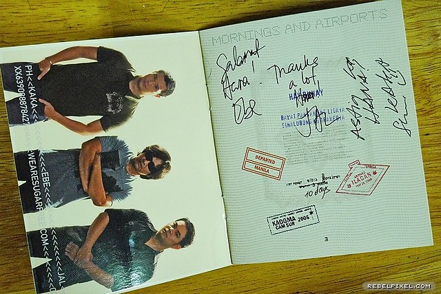 Our signed passport-inspired CD insert. Our signed passport-inspired CD insert.