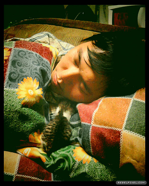 Sharing a sleepy moment with me. Sharing a sleepy moment with me.